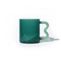 Jadegroene glazen mok