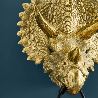 Triceratops Cera Gold wandlamp, hars, 31,5 x 28,5 cm