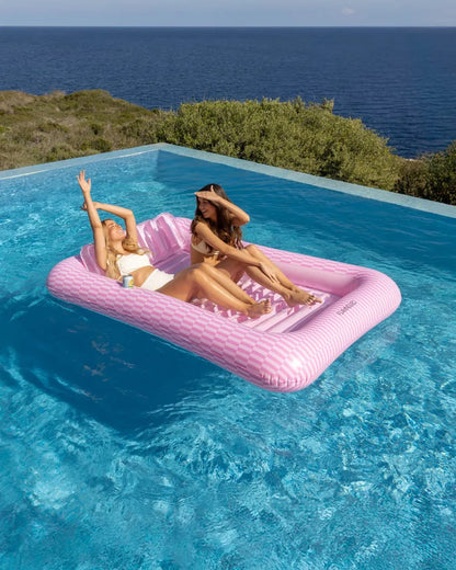 Pink Portofino tanning pool float