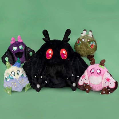 Group Photo of Standard Baby Mothman, Mini Sakura, Goblincore, Punk Rock, and Fairy Mothmen